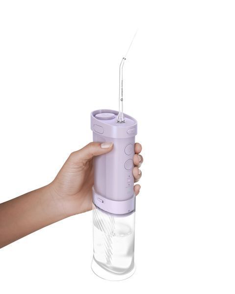 Іригатор Philips портативний Sonicare Compact Flosser 1000, чаша 200 мл, складний, фіолетовий HX3333/23 фото