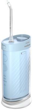 Іригатор Philips портативний Sonicare Compact Flosser 1000, чаша 200 мл, складний, голубий HX3333/24 фото
