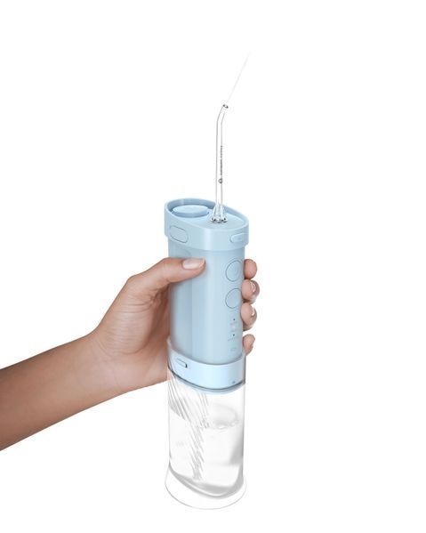Іригатор Philips портативний Sonicare Compact Flosser 1000, чаша 200 мл, складний, голубий HX3333/24 фото