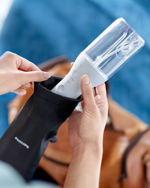 Philips Ирригатор Sonicare Cordless Power Flosser 3000 портативний, чаша 250 мл, чехол, 2 насадки , белый HX3826/31 фото