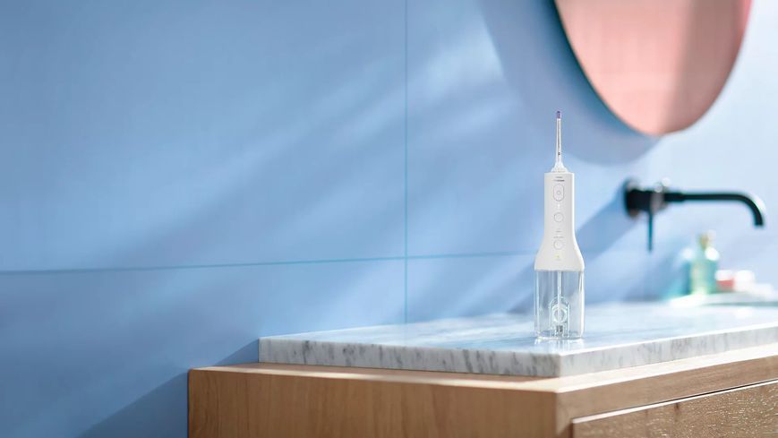 Philips Ирригатор Sonicare Cordless Power Flosser 3000 портативний, чаша 250 мл, чехол, 2 насадки , белый HX3826/31 фото