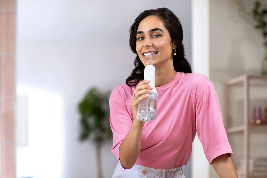 Philips Ирригатор Sonicare Cordless Power Flosser 3000 портативний, чаша 250 мл, чехол, 2 насадки , белый HX3826/31 фото