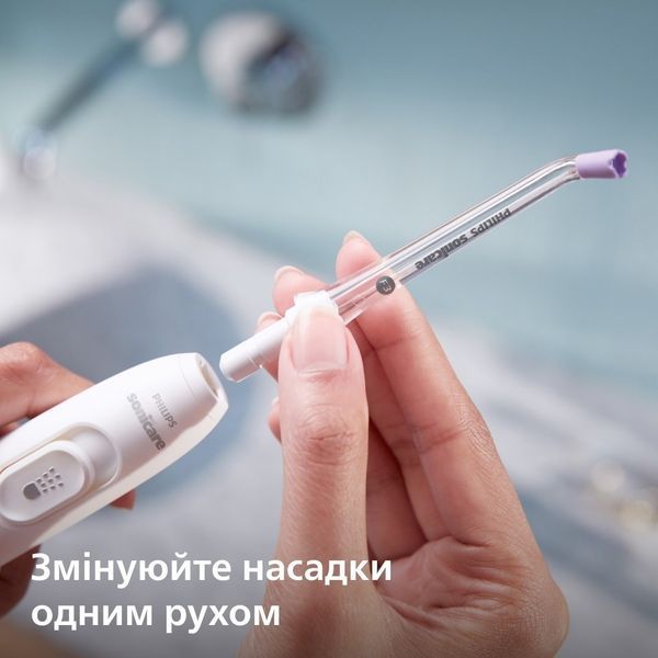 Іригатор Philips стаціонарний Sonicare Philips Sonicare Power Flosser 7000, чаша 600 мл, від мережі , чохол, 4 насадки , білий HX3911/40 фото