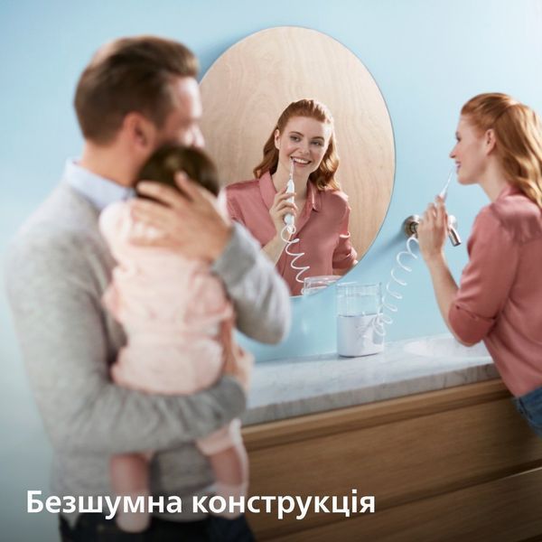 Іригатор Philips стаціонарний Sonicare Philips Sonicare Power Flosser 7000, чаша 600 мл, від мережі , чохол, 4 насадки , білий HX3911/40 фото