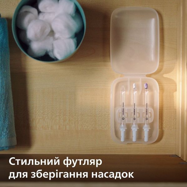 Іригатор Philips стаціонарний Sonicare Philips Sonicare Power Flosser 7000, чаша 600 мл, від мережі , чохол, 4 насадки , білий HX3911/40 фото